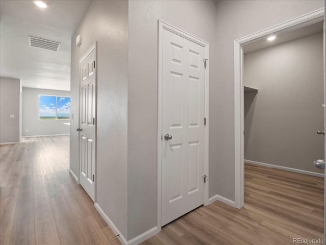 17557 E 89th Way, Commerce City, CO 80022 - hallway with light wood-style floors and baseboards