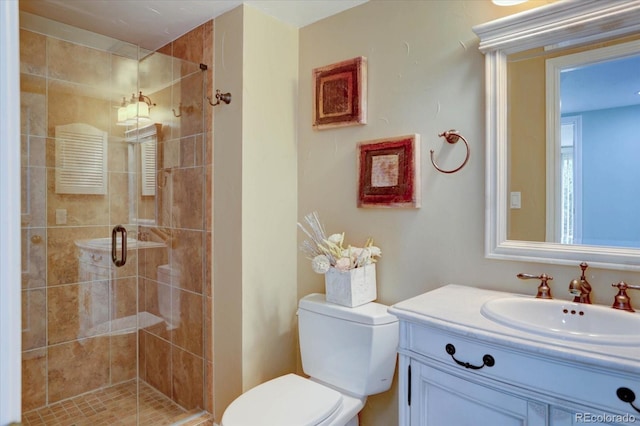 7715 S Hudson Ct, Centennial, CO 80122 - bathroom with toilet, a stall shower, and vanity