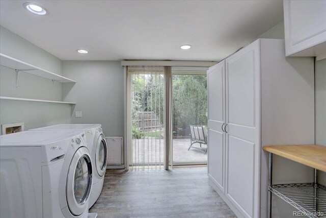 7715 S Hudson Ct, Centennial, CO 80122 - laundry room featuring washer and dryer, light wood-style flooring, cabinet space, and recessed lighting