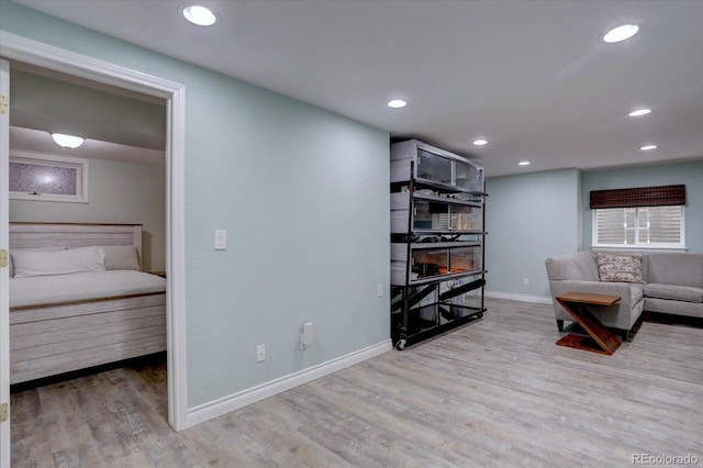 7715 S Hudson Ct, Centennial, CO 80122 - sitting room featuring wood finished floors, recessed lighting, and baseboards