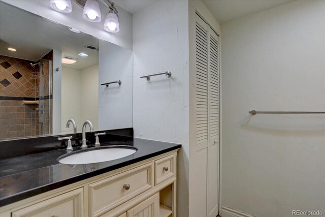 7715 S Hudson Ct, Centennial, CO 80122 - full bathroom featuring a closet and vanity