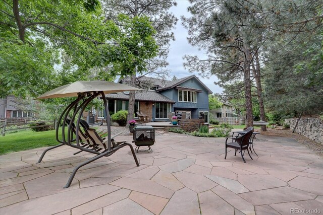 7715 S Hudson Ct, Centennial, CO 80122 - view of patio / terrace featuring central AC unit