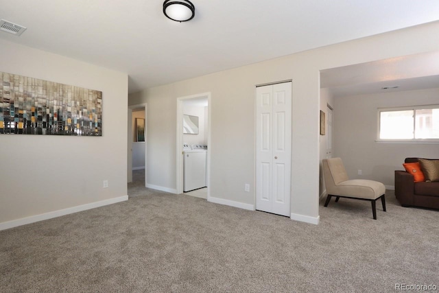 interior space with visible vents, baseboards, a closet, and connected bathroom