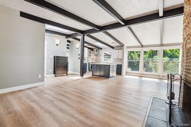 6057 S Windermere Way, Littleton, CO 80120 - unfurnished living room featuring light wood-style flooring