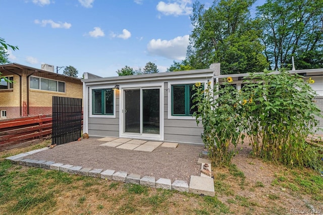 6057 S Windermere Way, Littleton, CO 80120 - rear view of house with a patio