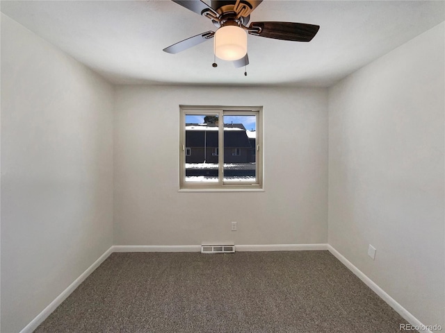 unfurnished room with carpet floors and ceiling fan