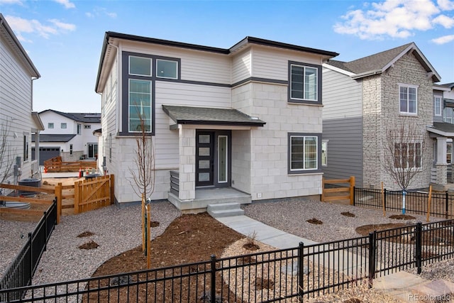 view of front facade featuring a fenced backyard