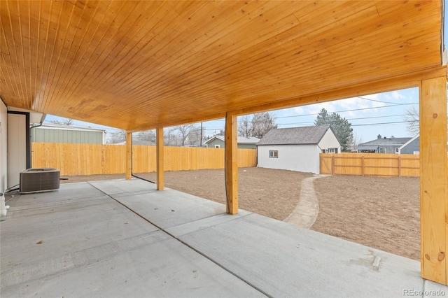 view of patio / terrace featuring an outdoor structure and central AC unit