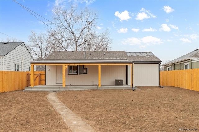 back of house with a patio area and cooling unit