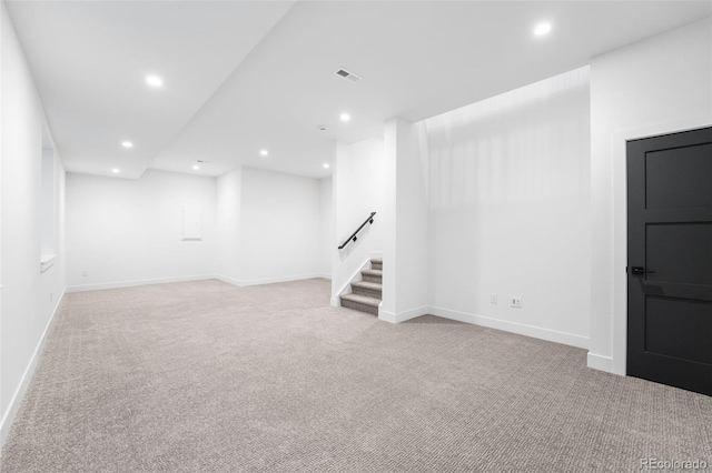 basement with light carpet