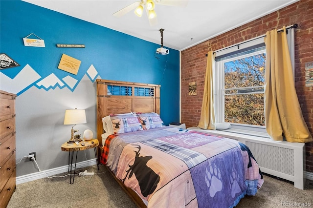 1450 N High St Unit 3, Denver, CO 80218 - carpeted bedroom featuring radiator, brick wall, and ceiling fan