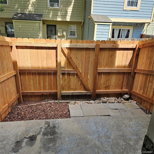 1641 S Idalia Cir Unit F, Aurora, CO 80017 - gate with a fenced backyard and a patio area