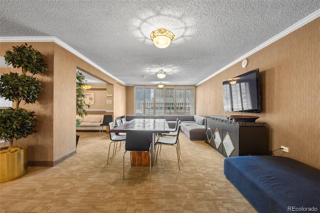 dining space featuring a textured ceiling and crown molding