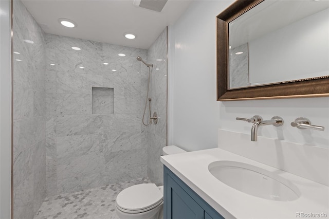 220 E Ln Bonte St Unit 317, Dillon, CO 80435 - full bath featuring vanity, toilet, a tile shower, and recessed lighting