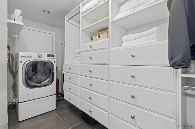 220 E Ln Bonte St Unit 317, Dillon, CO 80435 - laundry area featuring washer / dryer and dark tile patterned flooring