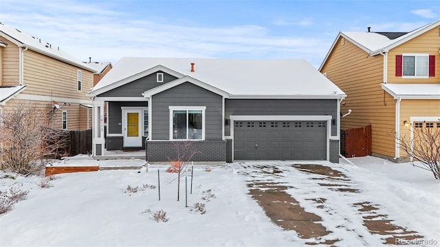 view of front of property with a garage