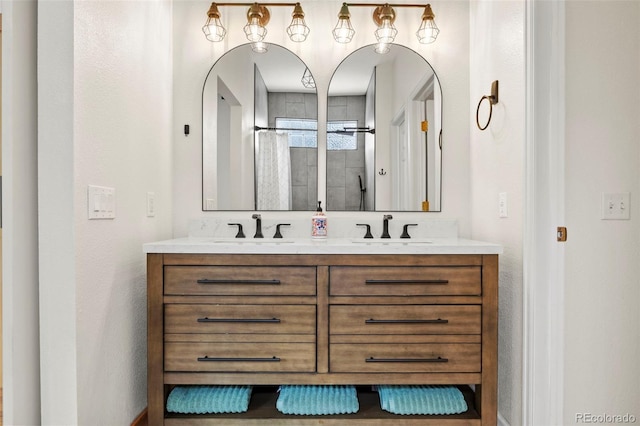 bathroom featuring vanity and walk in shower