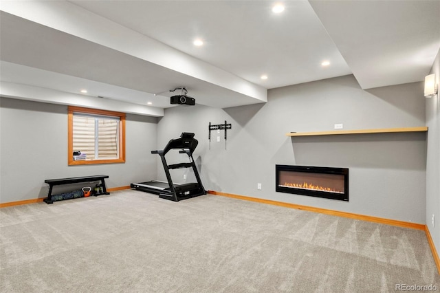 exercise area featuring carpet floors