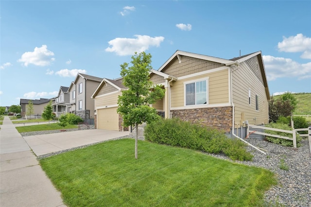 17710 E Emilia Dr, Parker, CO 80134 - craftsman-style home with stone siding, concrete driveway, an attached garage, and a residential view