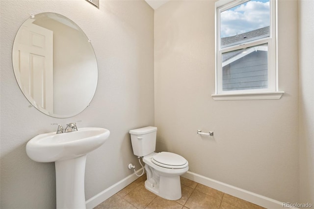 17710 E Emilia Dr, Parker, CO 80134 - half bathroom with baseboards and tile patterned flooring