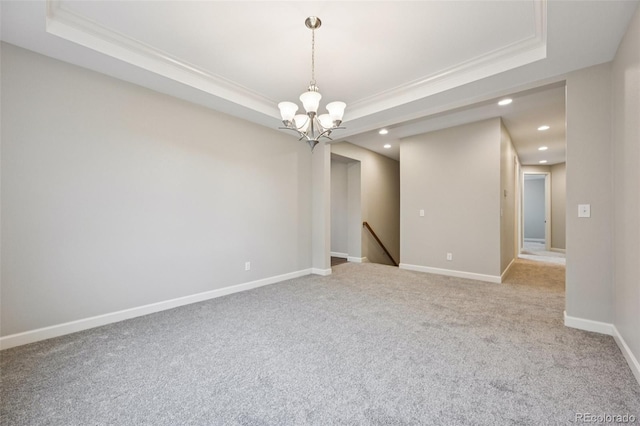 17710 E Emilia Dr, Parker, CO 80134 - carpeted empty room with a raised ceiling, ornamental molding, recessed lighting, and a chandelier