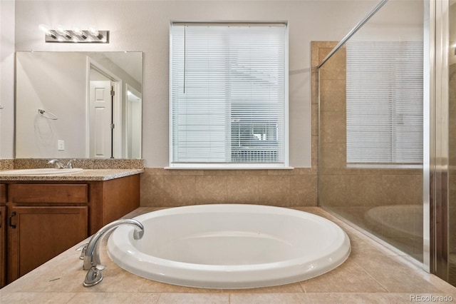 17710 E Emilia Dr, Parker, CO 80134 - full bathroom featuring a garden tub and vanity