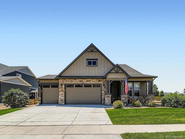 7702 E 157th Ave, Thornton, CO 80602 - craftsman-style house featuring concrete driveway, a garage, a front lawn, board and batten siding, and stone siding