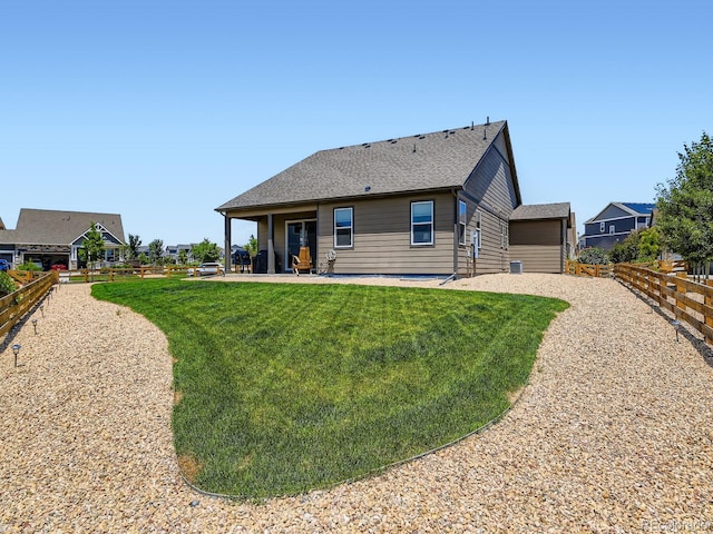 7702 E 157th Ave, Thornton, CO 80602 - back of house with a patio area, a fenced backyard, and roof with shingles