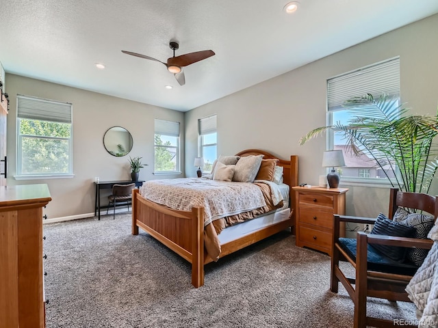7702 E 157th Ave, Thornton, CO 80602 - bedroom with multiple windows, carpet, recessed lighting, and a ceiling fan