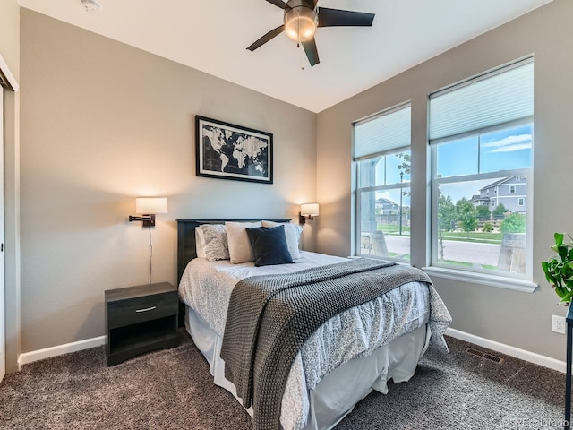 7702 E 157th Ave, Thornton, CO 80602 - carpeted bedroom featuring baseboards and a ceiling fan