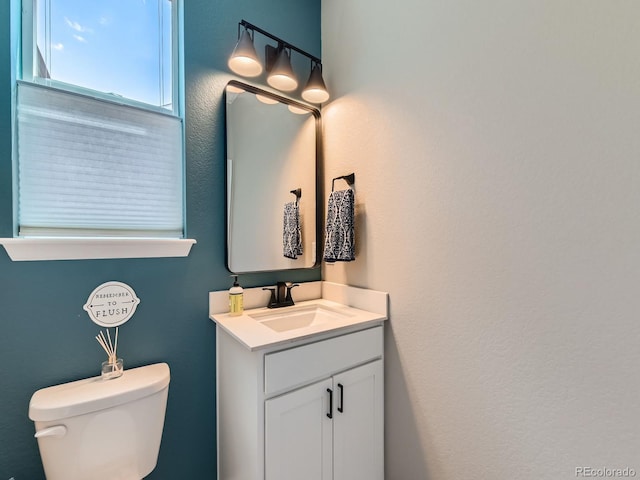 7702 E 157th Ave, Thornton, CO 80602 - half bathroom with vanity and toilet
