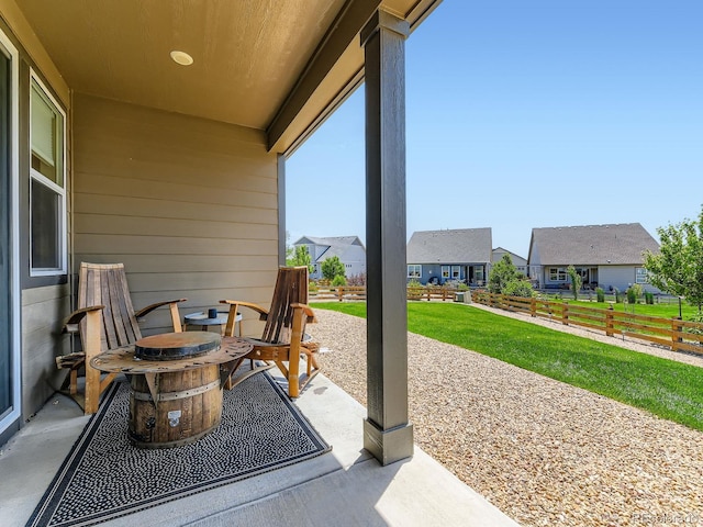 7702 E 157th Ave, Thornton, CO 80602 - view of patio / terrace with a residential view
