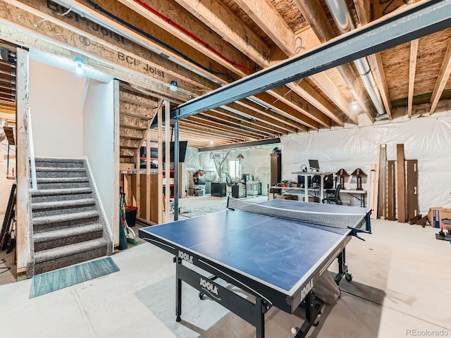 7702 E 157th Ave, Thornton, CO 80602 - game room featuring concrete flooring