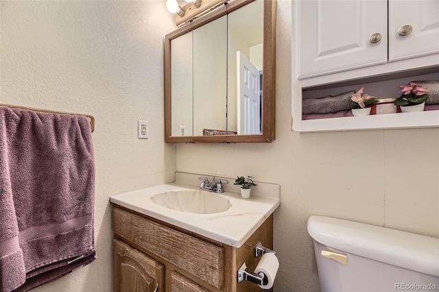 15705 E Brown Ave, Aurora, CO 80013 - bathroom featuring vanity and toilet