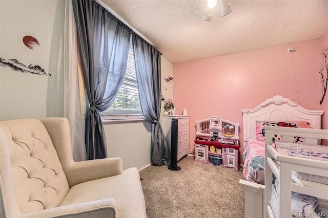 15705 E Brown Ave, Aurora, CO 80013 - bedroom with a textured ceiling and carpet floors