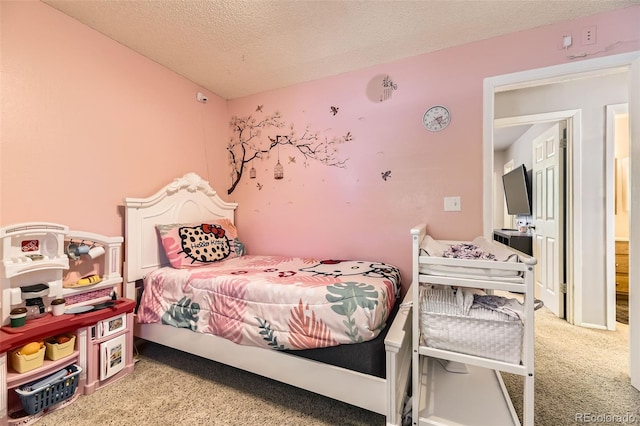 15705 E Brown Ave, Aurora, CO 80013 - bedroom featuring carpet floors and a textured ceiling