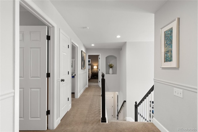 7106 Cerney Cir, Castle Pines, CO 80108 - hall with recessed lighting, an upstairs landing, and light carpet