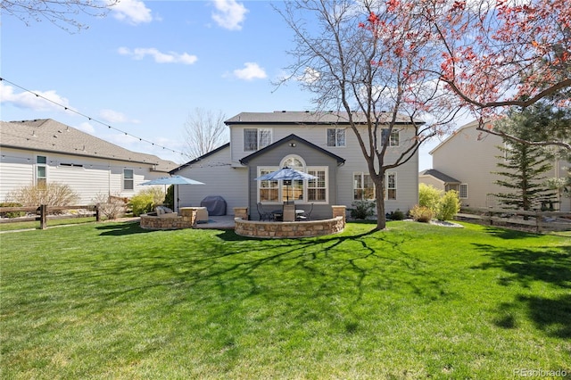 7106 Cerney Cir, Castle Pines, CO 80108 - rear view of property with a lawn, fence, and a patio