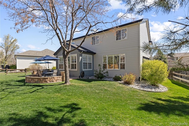7106 Cerney Cir, Castle Pines, CO 80108 - back of house with a lawn, fence, and a patio area