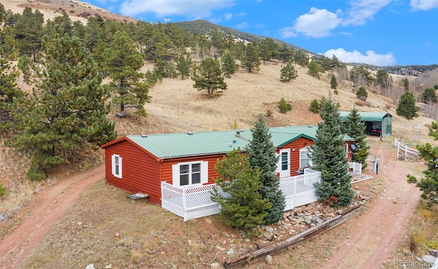 drone / aerial view featuring a mountain view