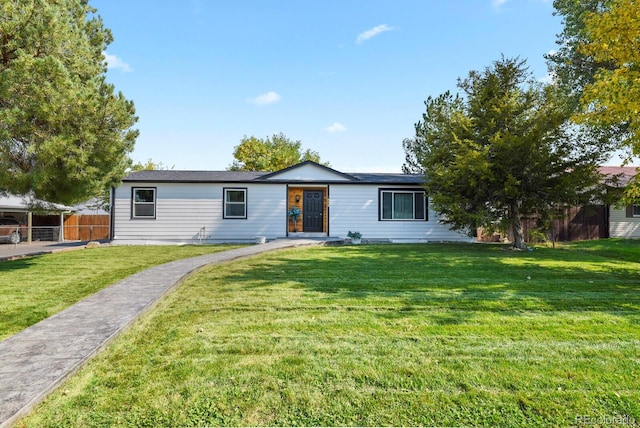 single story home with a front lawn