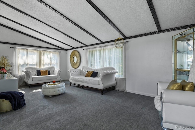 carpeted living room featuring vaulted ceiling with beams and a textured ceiling