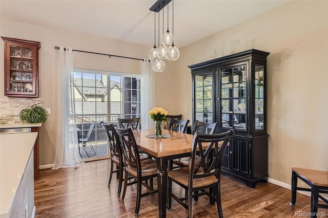 dining room featuring dark hardwood / wood-style floors