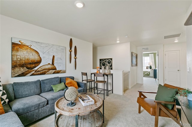 living room featuring light colored carpet