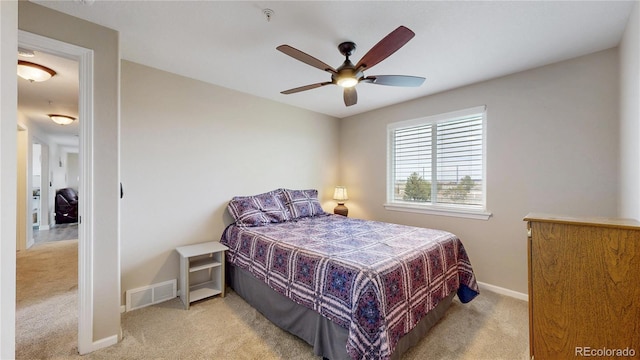 32350 E 137th Way, Brighton, CO 80603 - bedroom featuring light colored carpet, baseboards, and a ceiling fan