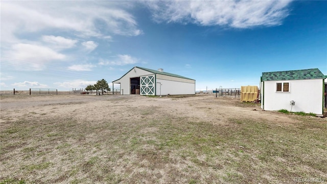 32350 E 137th Way, Brighton, CO 80603 - view of yard featuring fence, an outdoor structure, and a pole building