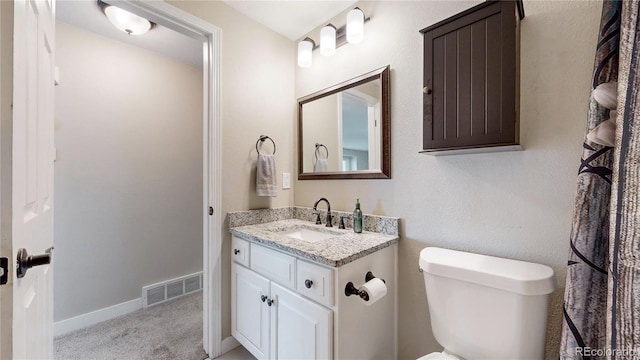 32350 E 137th Way, Brighton, CO 80603 - half bath with toilet, vanity, and baseboards