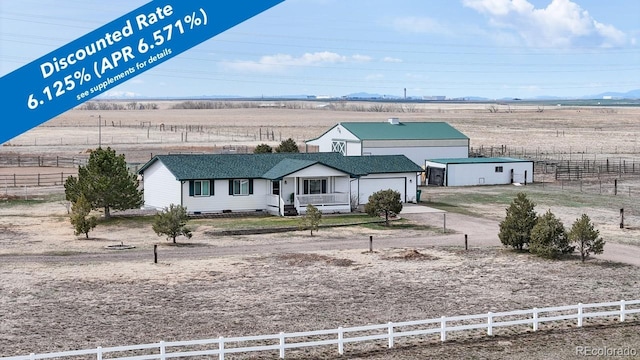 32350 E 137th Way, Brighton, CO 80603 - exterior space with a garage, driveway, a view of countryside, and covered porch