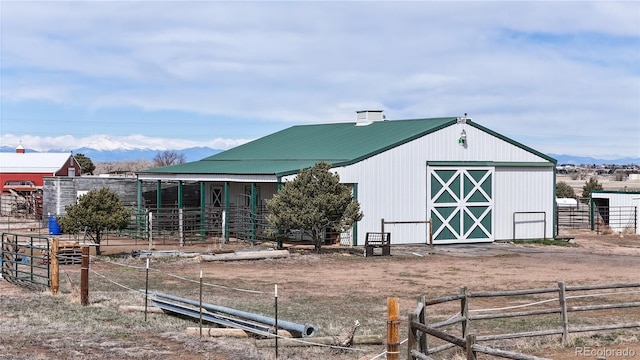 32350 E 137th Way, Brighton, CO 80603 - view of outdoor structure featuring an exterior structure and a mountain view