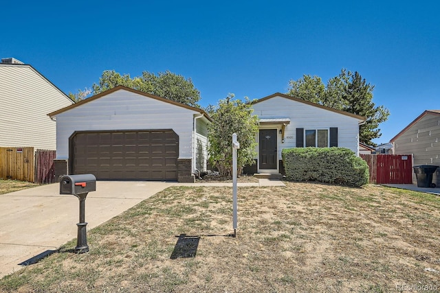 4600 Dillon St, Denver, CO 80239 - ranch-style house featuring fence and driveway
